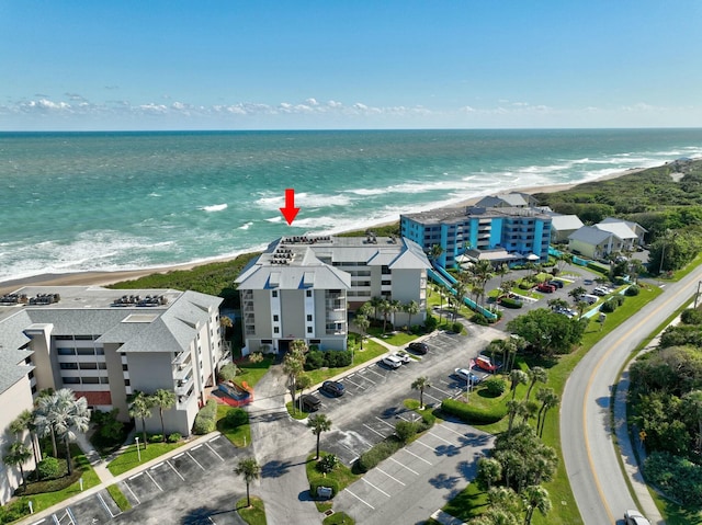 aerial view featuring a water view and a view of the beach