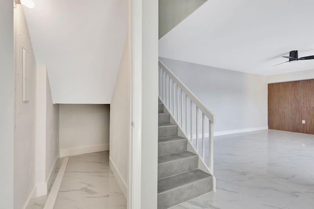 stairway with ceiling fan