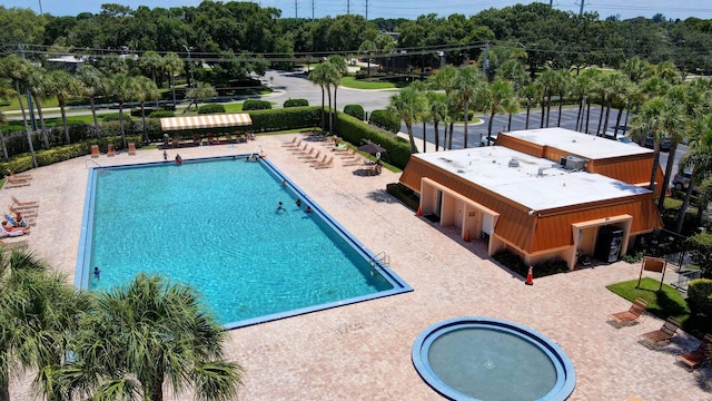 view of pool featuring a patio