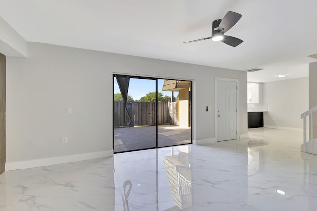 unfurnished room with ceiling fan