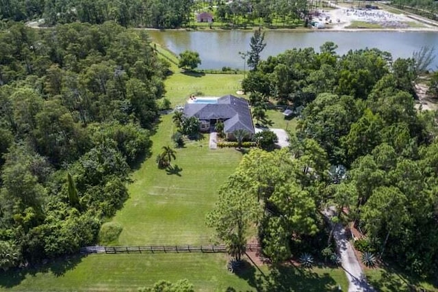 drone / aerial view featuring a rural view and a water view