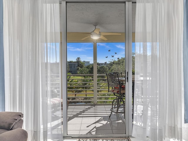 entryway with a ceiling fan