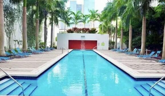 view of pool featuring a patio area