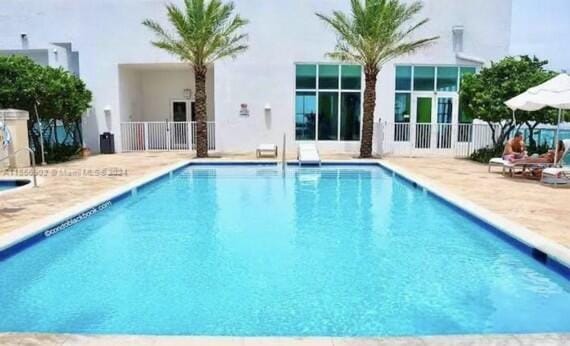 view of pool featuring a patio area