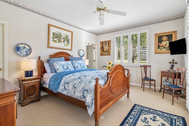 bedroom featuring ceiling fan and light colored carpet