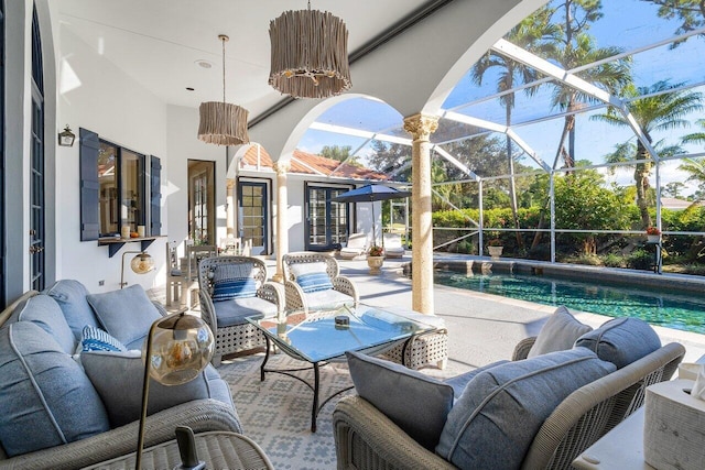 view of patio / terrace featuring french doors and a lanai