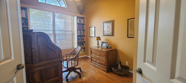 office area with hardwood / wood-style floors