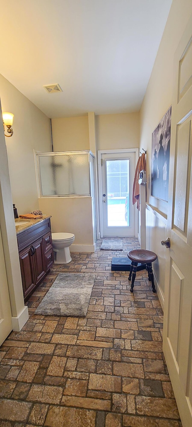 bathroom featuring toilet