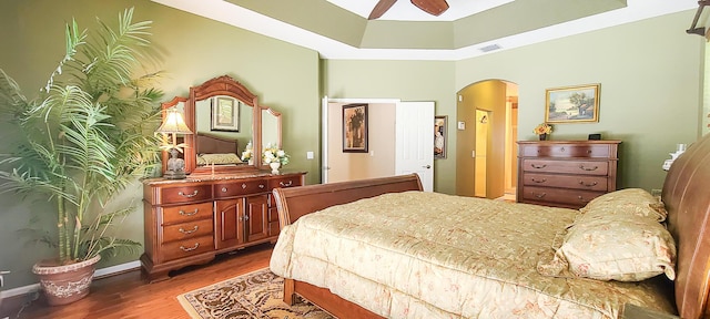 bedroom featuring ceiling fan and hardwood / wood-style flooring