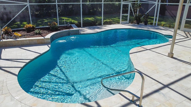 view of swimming pool featuring a patio