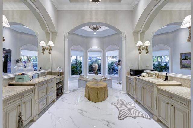 bathroom with a chandelier, vanity, crown molding, and a healthy amount of sunlight