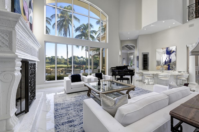 living room with a high ceiling