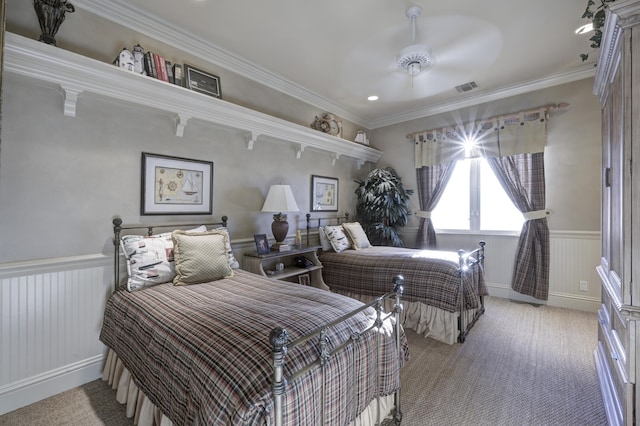 bedroom with light colored carpet, ceiling fan, and crown molding