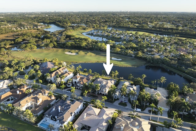 drone / aerial view with a water view