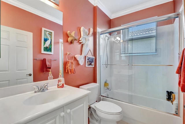 full bathroom with shower / bath combination with glass door, toilet, vanity, and ornamental molding