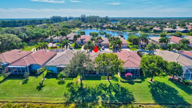 bird's eye view with a water view