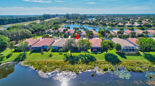 bird's eye view with a water view