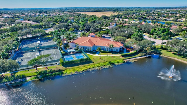 drone / aerial view with a water view