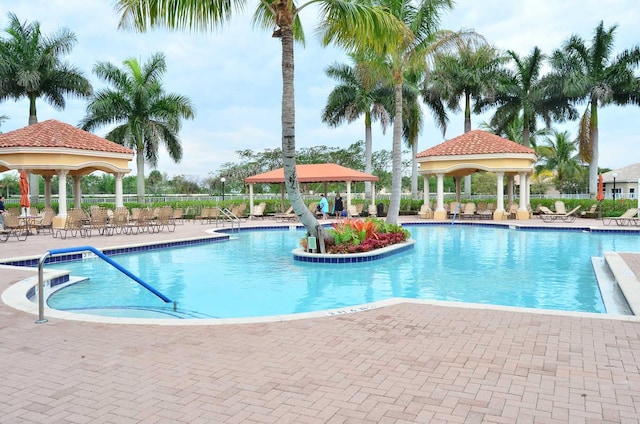 view of swimming pool featuring a gazebo and a patio