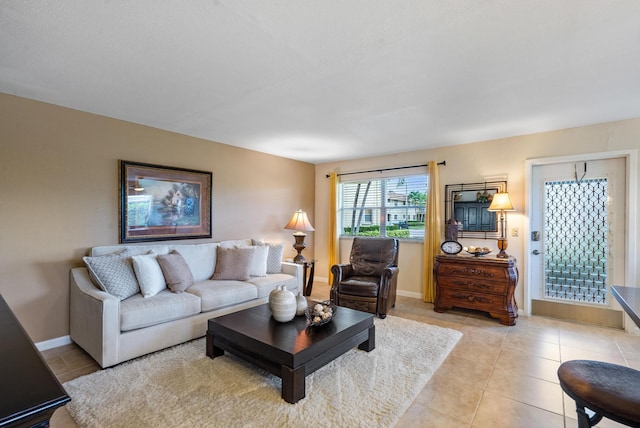 living room featuring light tile patterned flooring