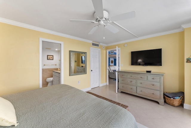 tiled bedroom with ensuite bathroom, ceiling fan, and crown molding