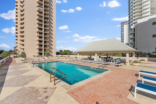 view of pool with a gazebo and a patio area