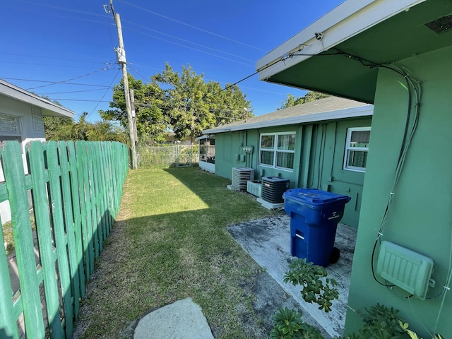 view of yard with central air condition unit