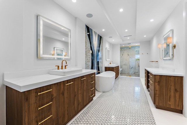 bathroom featuring vanity, ceiling fan, and shower with separate bathtub