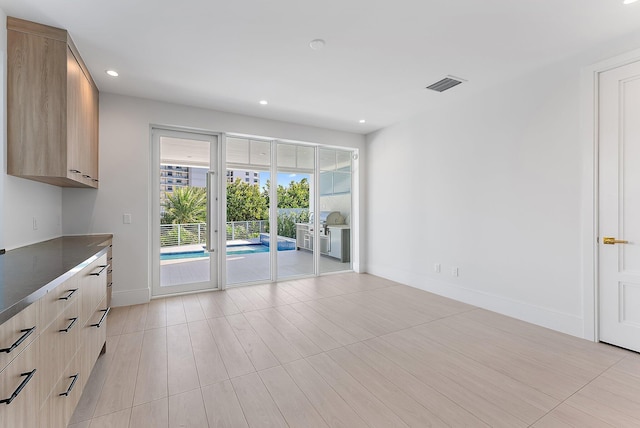 interior space with light hardwood / wood-style floors