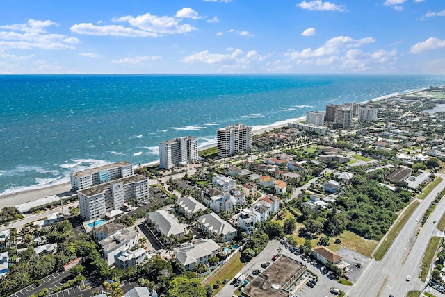 aerial view with a beach view and a water view