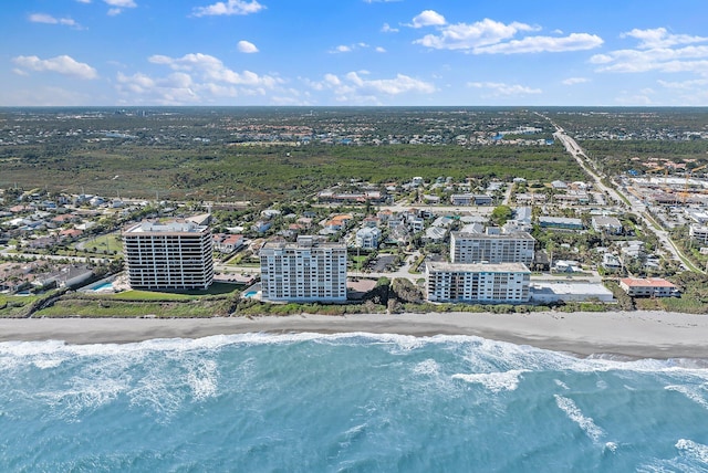 aerial view with a view of the beach and a water view