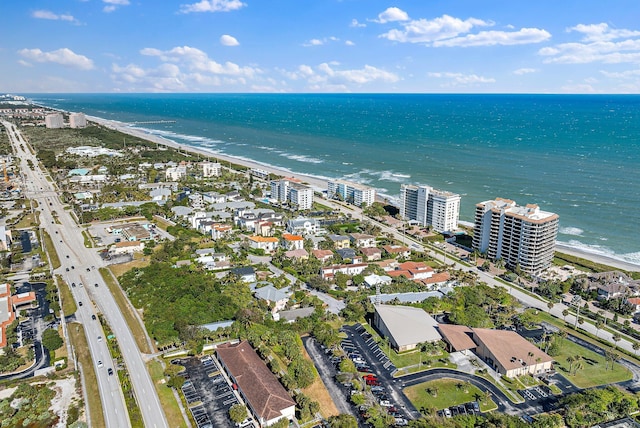 aerial view featuring a water view and a beach view