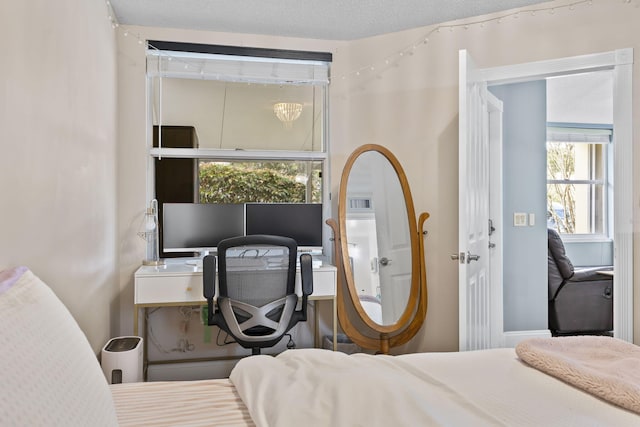 bedroom featuring a textured ceiling