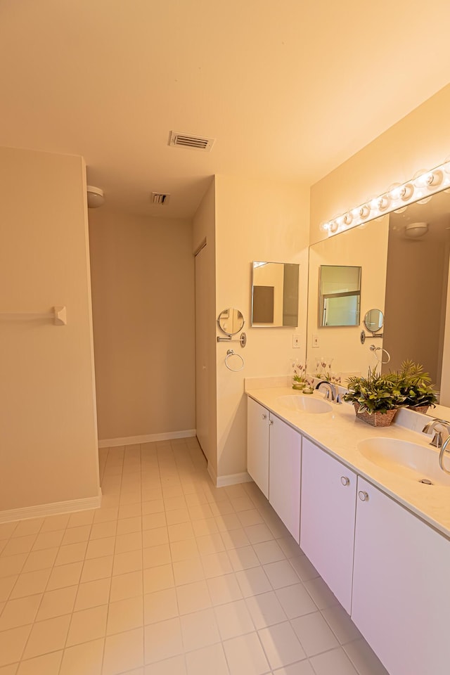 bathroom featuring vanity and tile patterned flooring