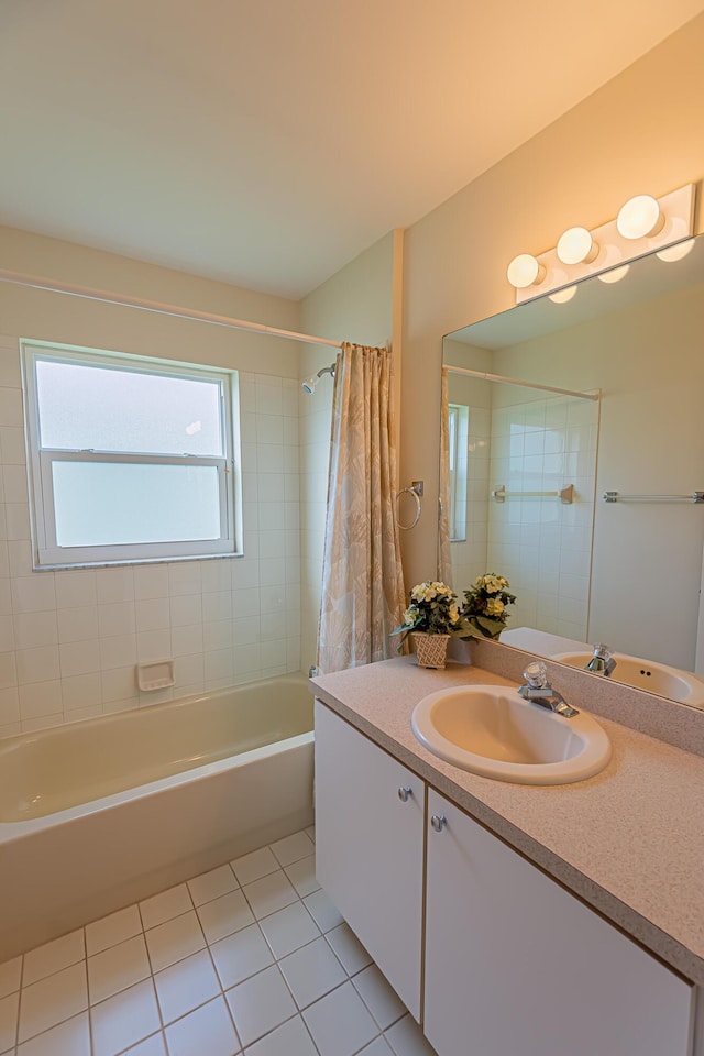 bathroom with tile patterned flooring, vanity, and shower / bathtub combination with curtain