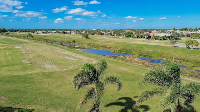 aerial view featuring a rural view and a water view