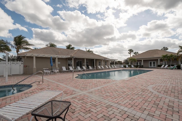 view of pool featuring a patio