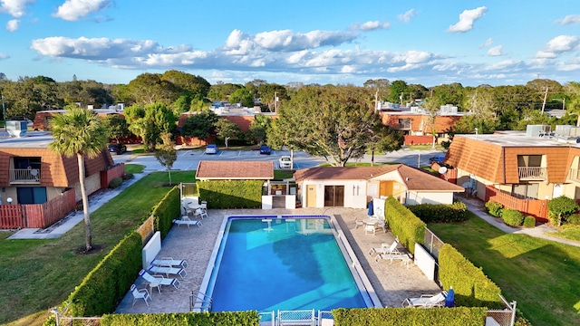 view of swimming pool with a patio area