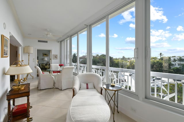 sunroom / solarium with ceiling fan