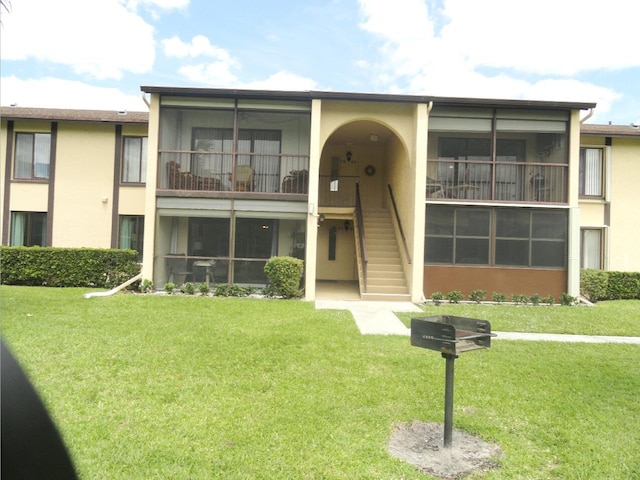 810 Sky Pine Way Unit F2, Greenacres, FL 33415 - view of building exterior with stairs