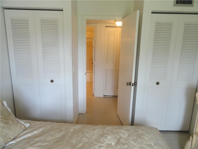 810 Sky Pine Way Unit F2, Greenacres, FL 33415 - tiled bedroom featuring a closet