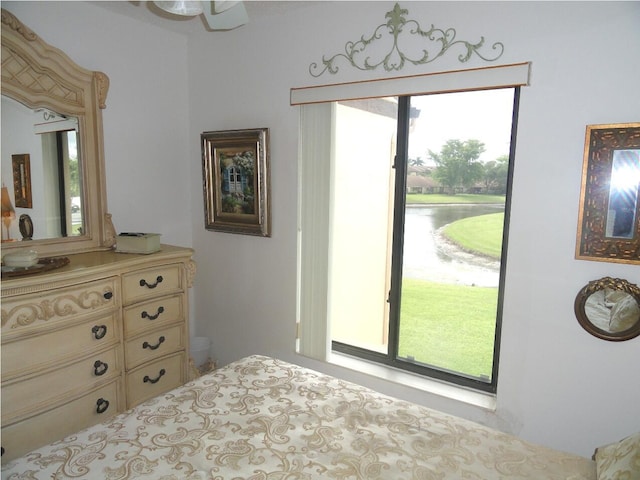 810 Sky Pine Way Unit F2, Greenacres, FL 33415 - bedroom with a water view