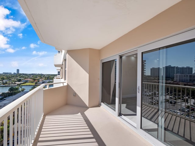 balcony featuring a water view