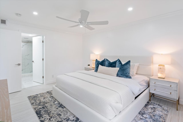 bedroom with ensuite bathroom, ceiling fan, and crown molding