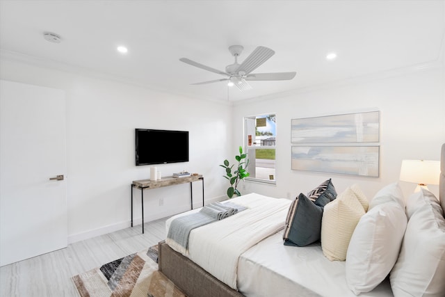 bedroom featuring ceiling fan and ornamental molding