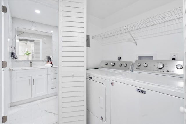 laundry room featuring sink and washing machine and clothes dryer