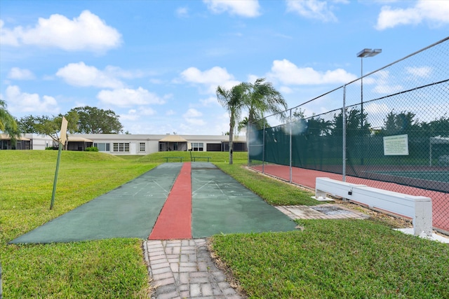 view of community with a lawn