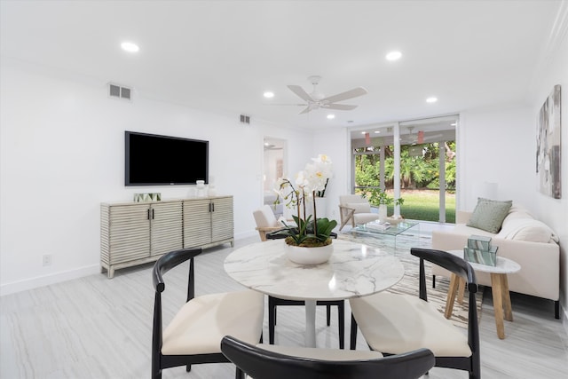 dining area featuring ceiling fan