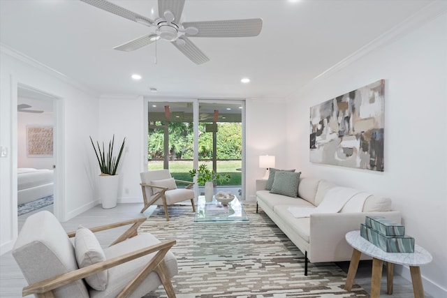 living room featuring ceiling fan and crown molding