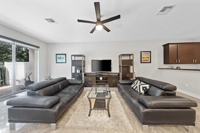 living room with ceiling fan